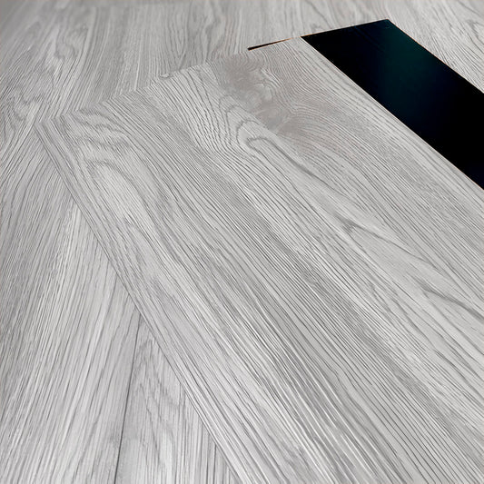 Piso Vinílico GRIS REQUIERE PEGAMENTO caja por 5.01 m2 (36 duelas) medidas 91.4x15.4 cm espesor 2 mm
